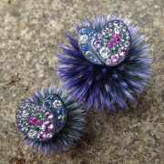 These custom made earrings, in blackened silver, paved with diamonds, sapphires of different colors and tsavorites, are very original, inspired by nature, and made in France.