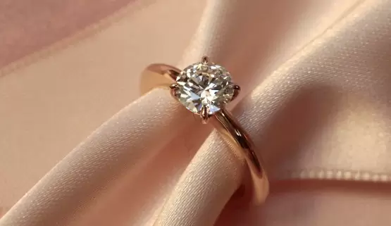 Solitaire engagement ring in rosegold with a 0.7 carat diamond. This ring was custom made in Paris by the jewellery designer Annette Girardon.