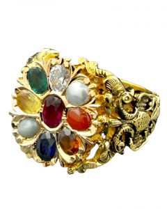 benefits of stones Gold ring with a lot of decorations in the metal an set with 9 various stones, which represent the 9 planets.